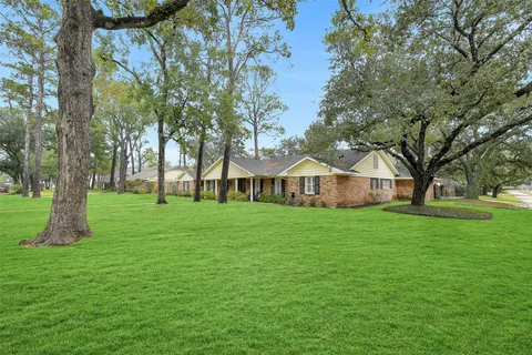 a view of a house with a big yard