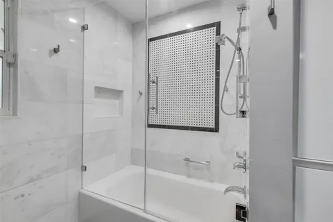 a kitchen with a sink dishwasher and cabinets