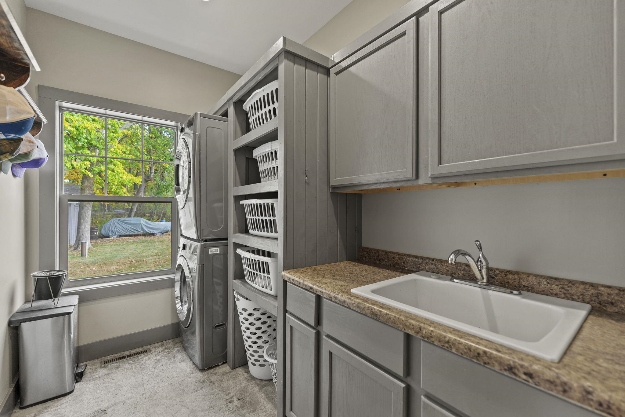 166 South Rocky Hill Road Galena, IL 61036 - Photo 13 of 57 a kitchen with a sink and a refrigerator