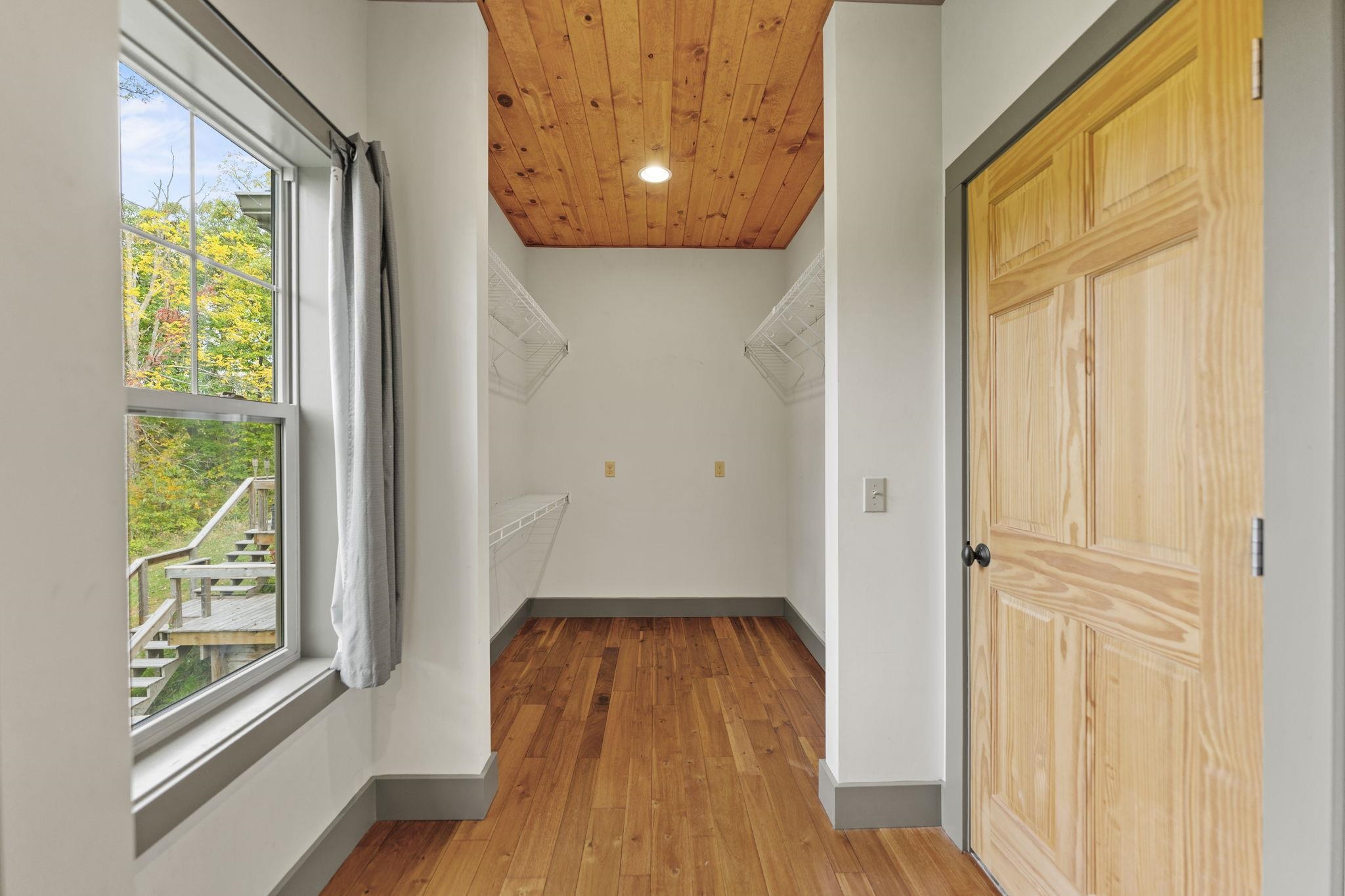 166 South Rocky Hill Road Galena, IL 61036 - Photo 20 of 57 a view of a room with wooden floor and windows
