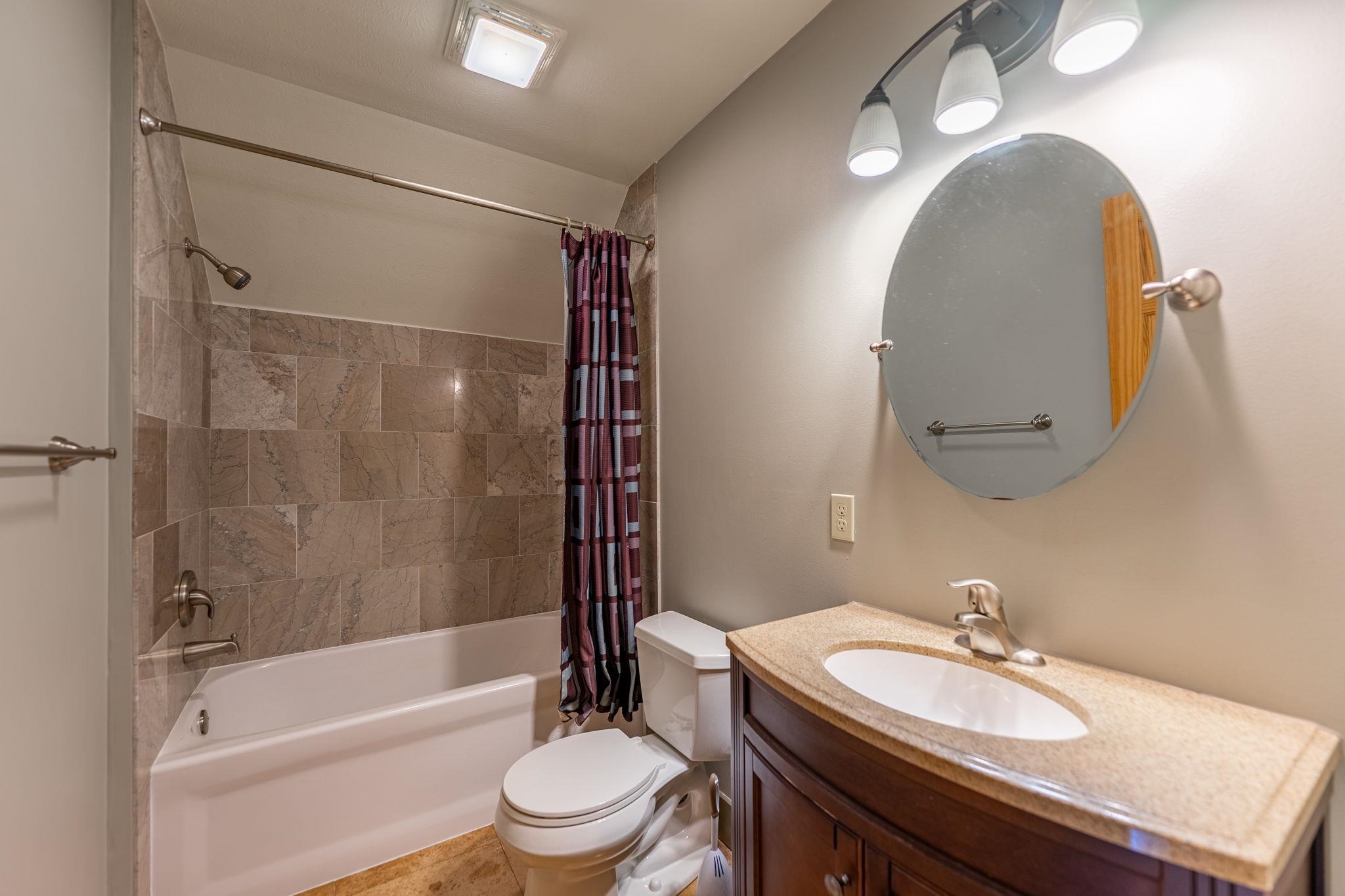 166 South Rocky Hill Road Galena, IL 61036 - Photo 24 of 57 a bathroom with a sink a toilet and a mirror