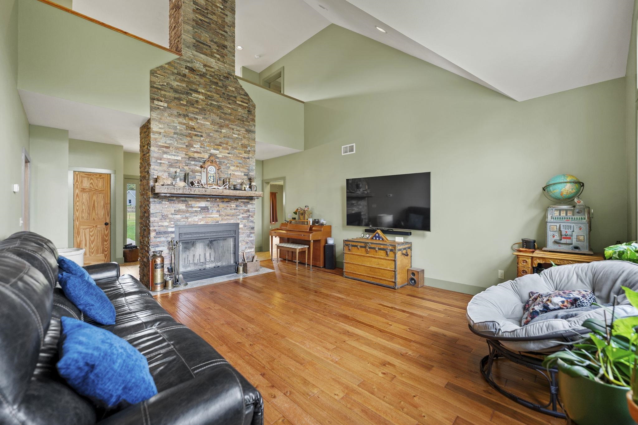 166 South Rocky Hill Road Galena, IL 61036 - Photo 8 of 57 a living room with furniture and a flat screen tv