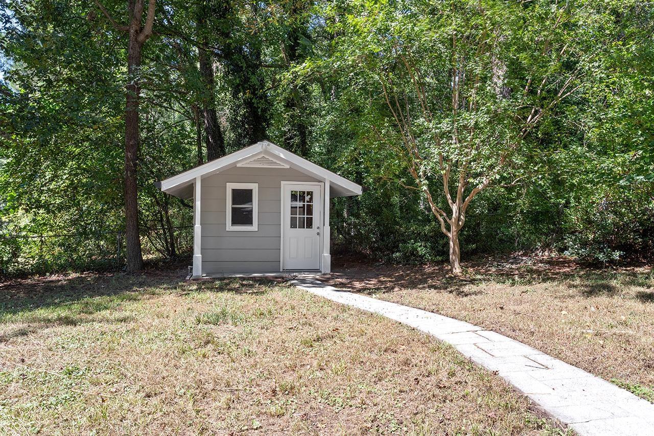 1307 Castlebay Road Durham, NC 27704 - Photo 39 of 41 a front view of a house with a garden