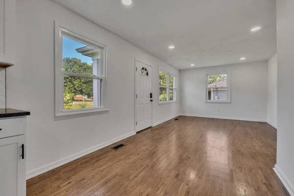 a view of an empty room and window