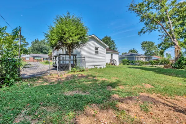 a house view with a garden space