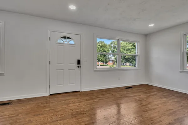 an empty room with windows