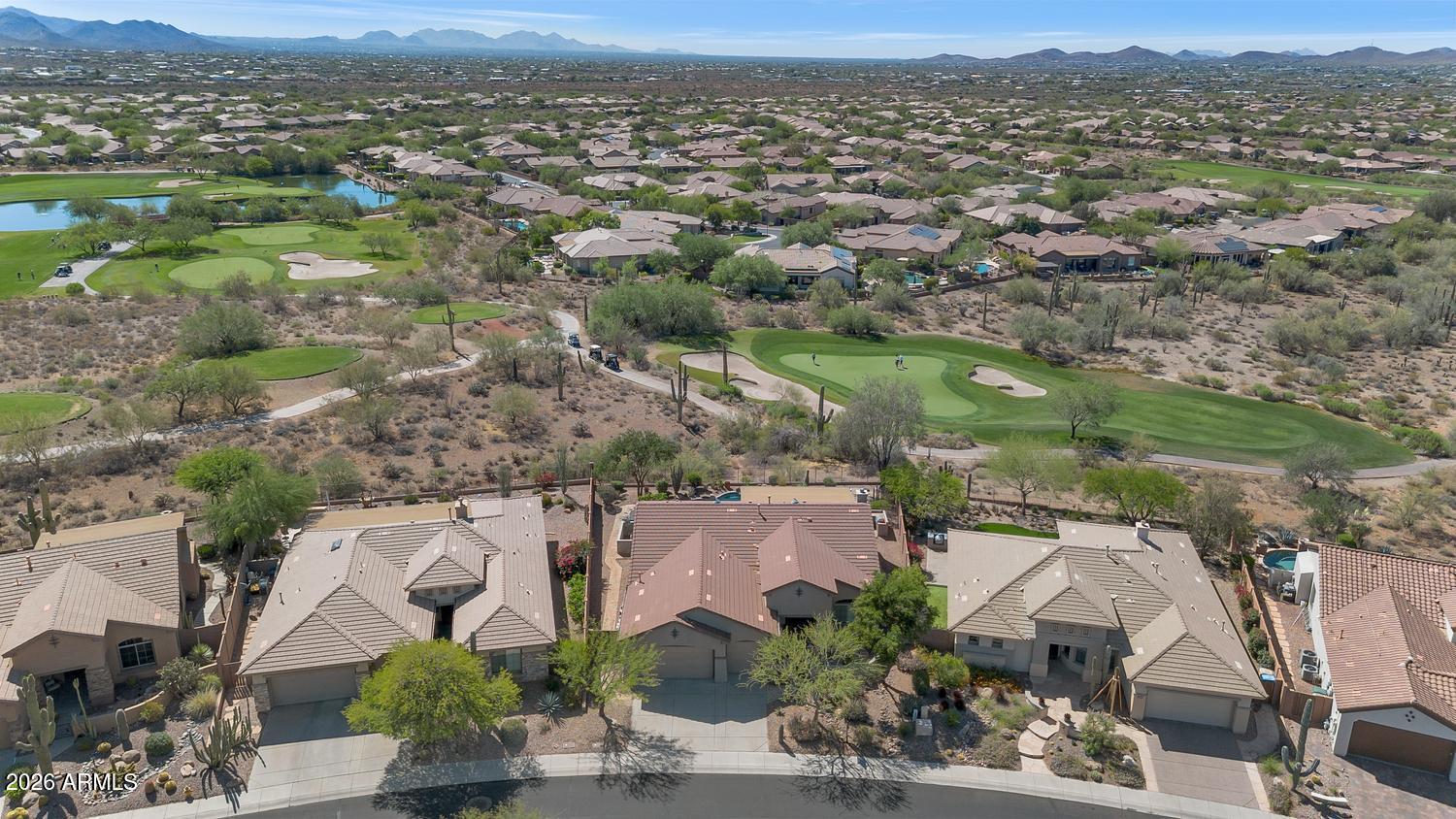 41123 North River Bend Road Phoenix, AZ 85086 - Photo 30 of 45 an aerial view of residential houses with outdoor space and trees