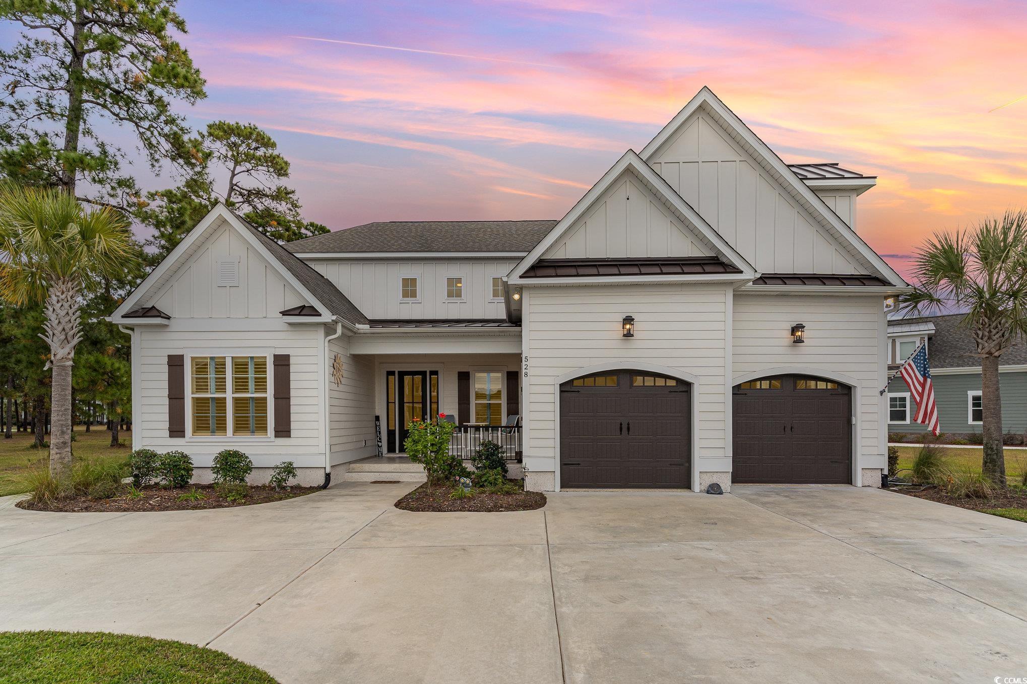 528 Starlit Way Myrtle Beach, SC 29579 - Photo 1 of 40 View of front facade featuring covered porch