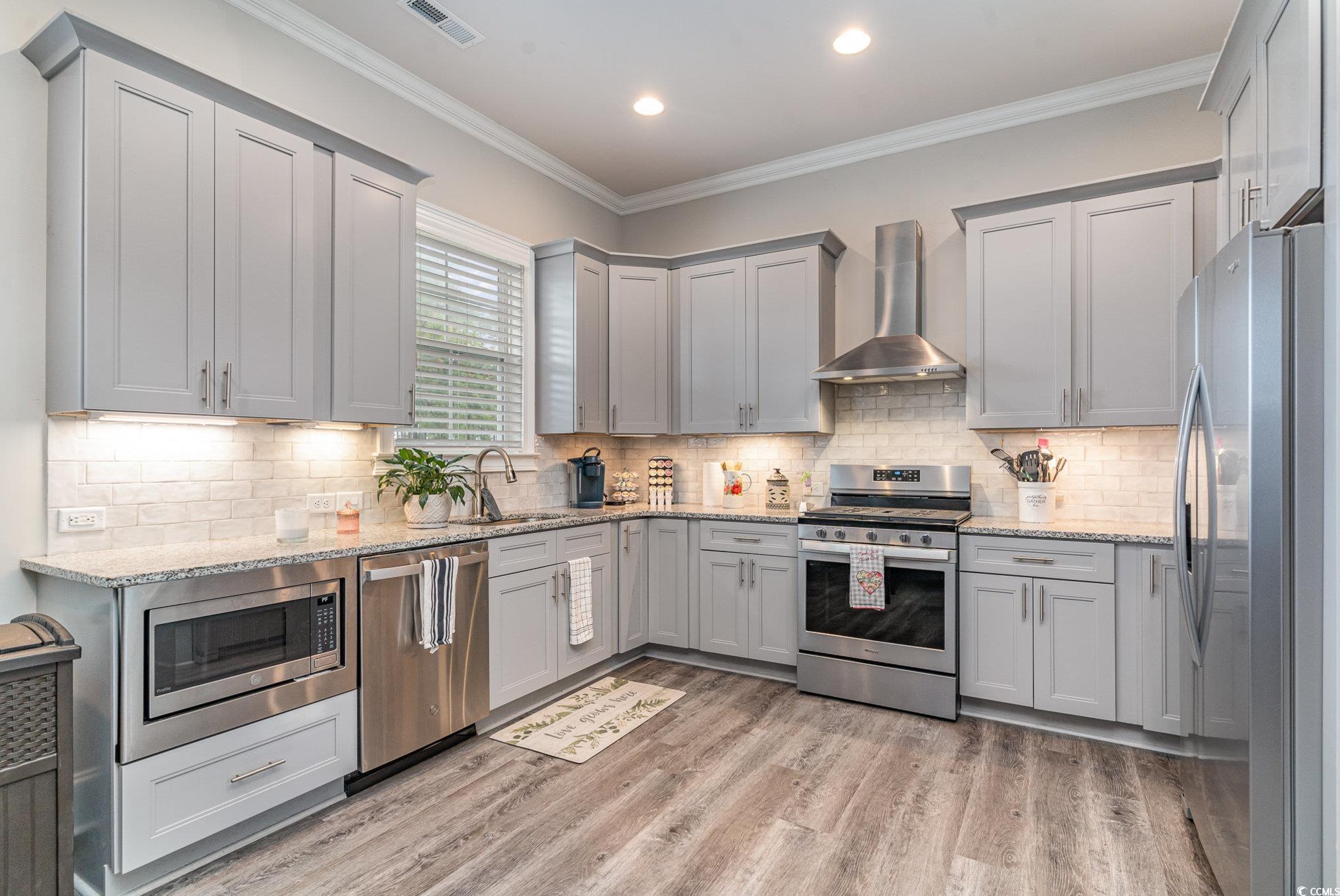 528 Starlit Way Myrtle Beach, SC 29579 - Photo 16 of 40 Kitchen with appliances with stainless steel finis