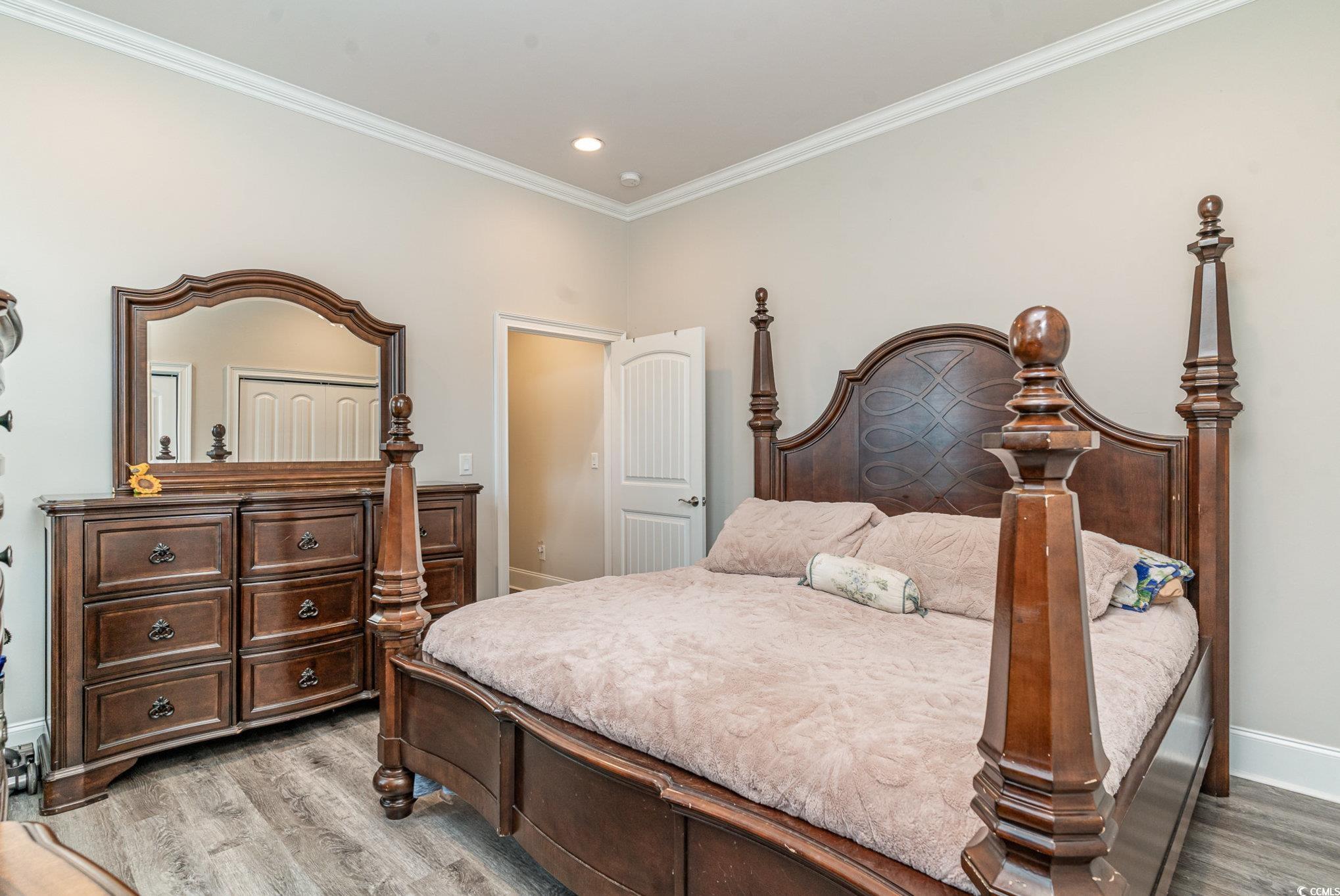 528 Starlit Way Myrtle Beach, SC 29579 - Photo 18 of 40 Bedroom with light hardwood / wood-style floors an