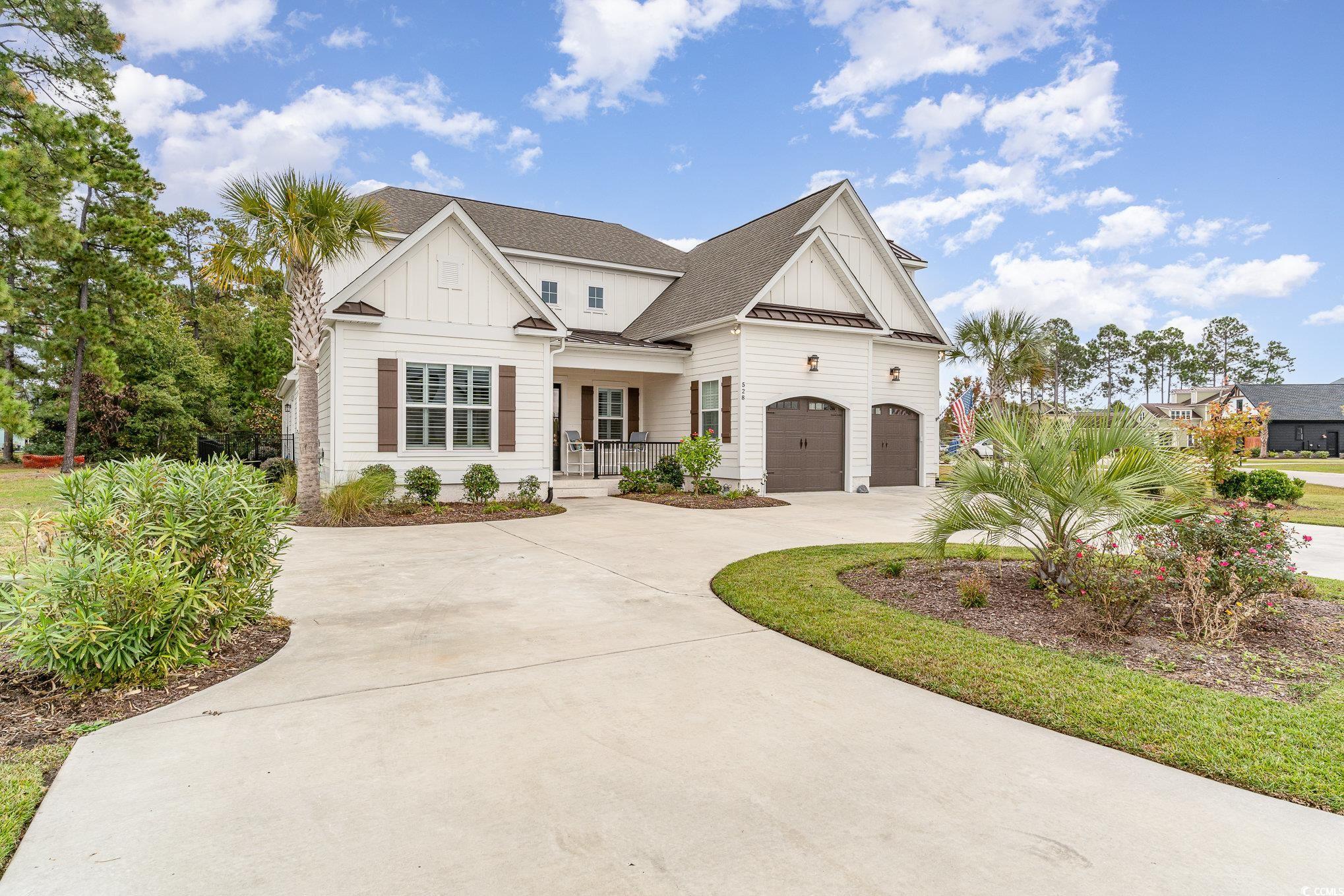 528 Starlit Way Myrtle Beach, SC 29579 - Photo 2 of 40 View of front of house featuring covered porch