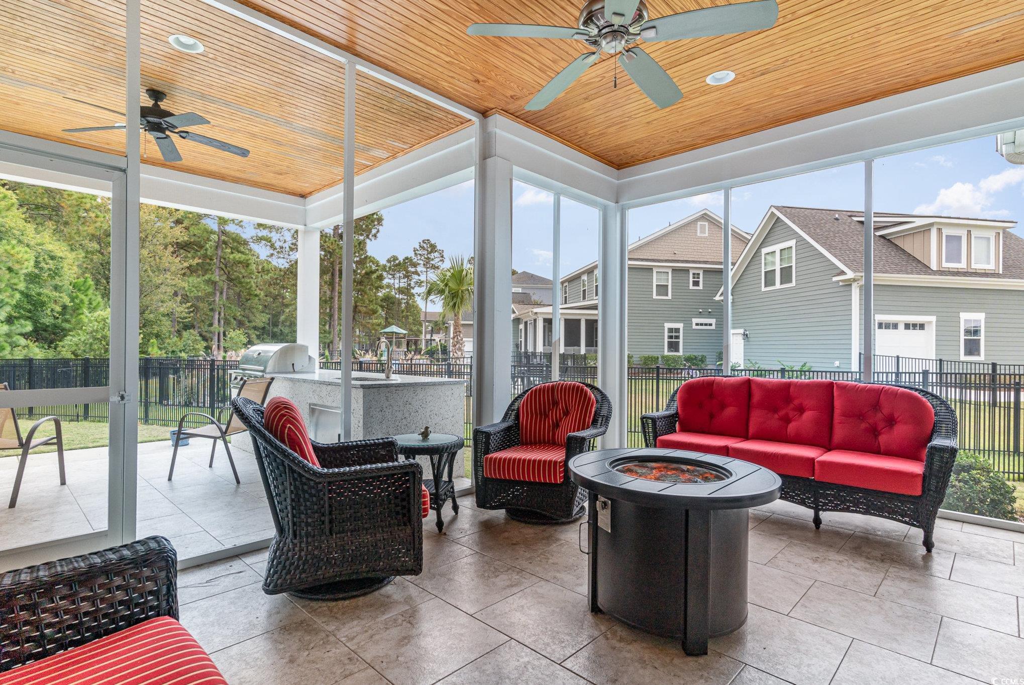 528 Starlit Way Myrtle Beach, SC 29579 - Photo 29 of 40 Sunroom featuring wood ceiling, plenty of natural