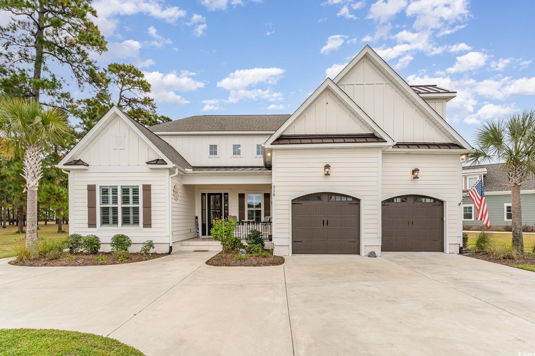 528 Starlit Way Myrtle Beach, SC 29579 - Photo 3 of 40 View of front of property featuring a porch and a