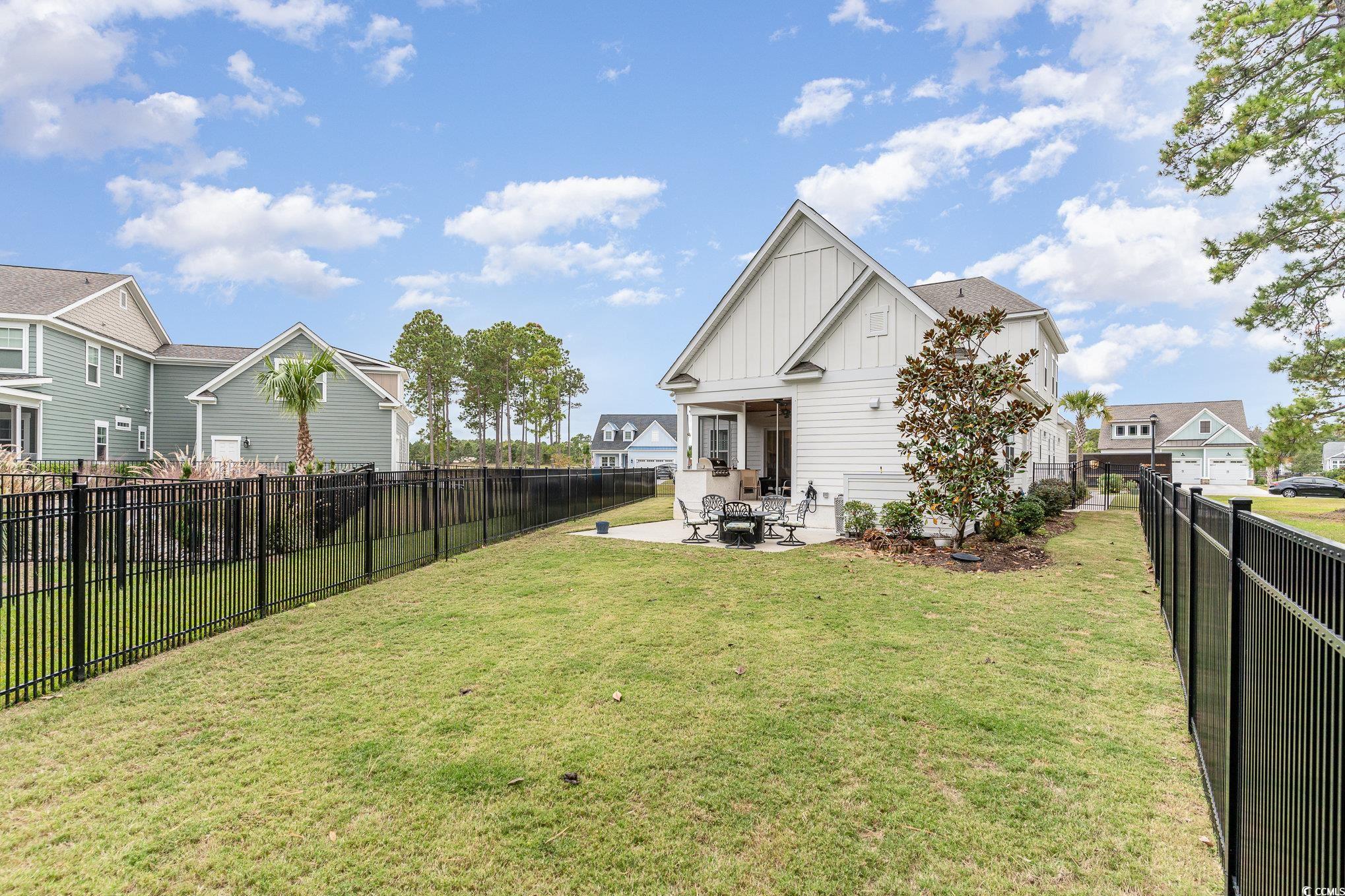 528 Starlit Way Myrtle Beach, SC 29579 - Photo 34 of 40 View of yard featuring a patio area