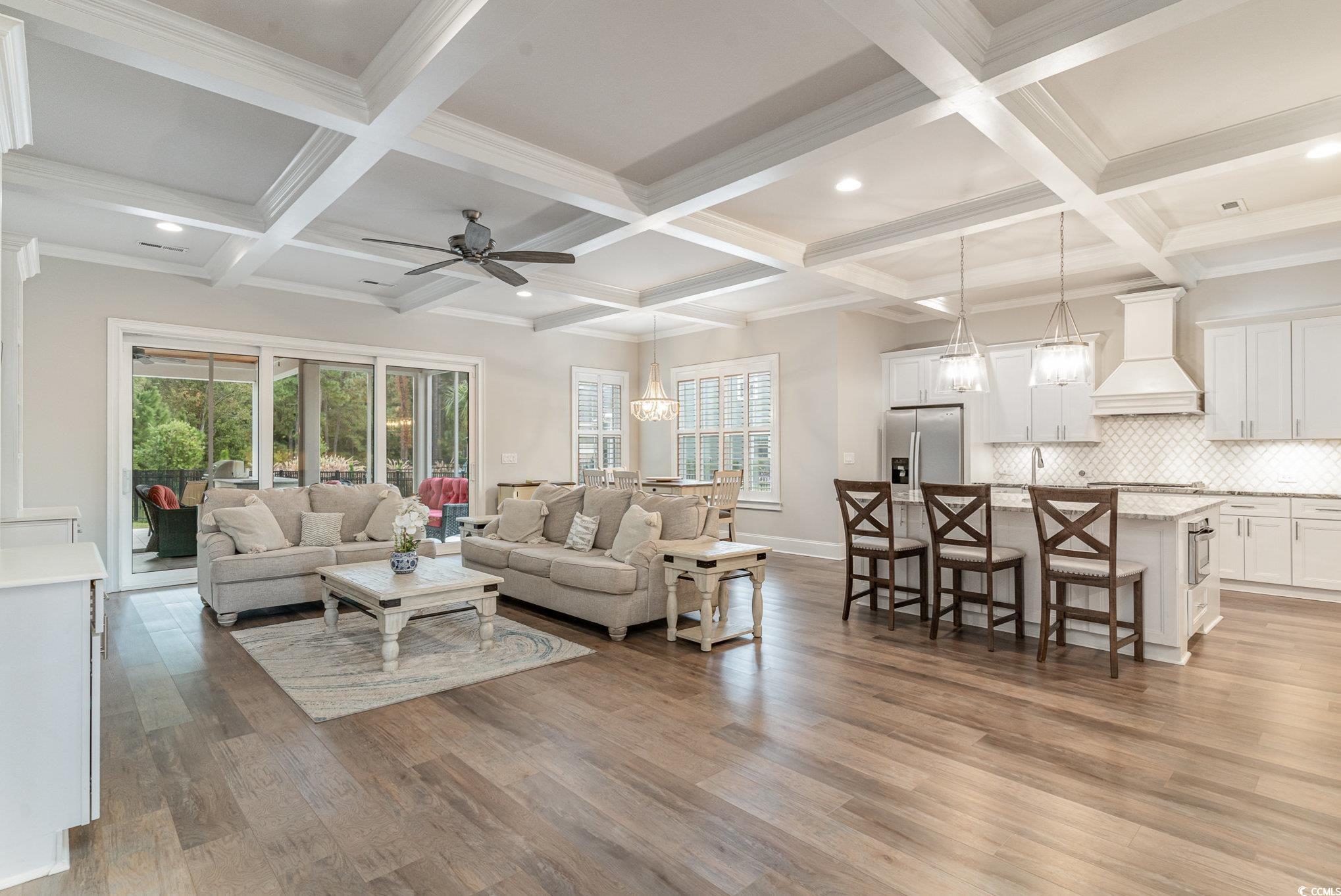 528 Starlit Way Myrtle Beach, SC 29579 - Photo 6 of 40 Living room featuring beam ceiling, coffered ceili