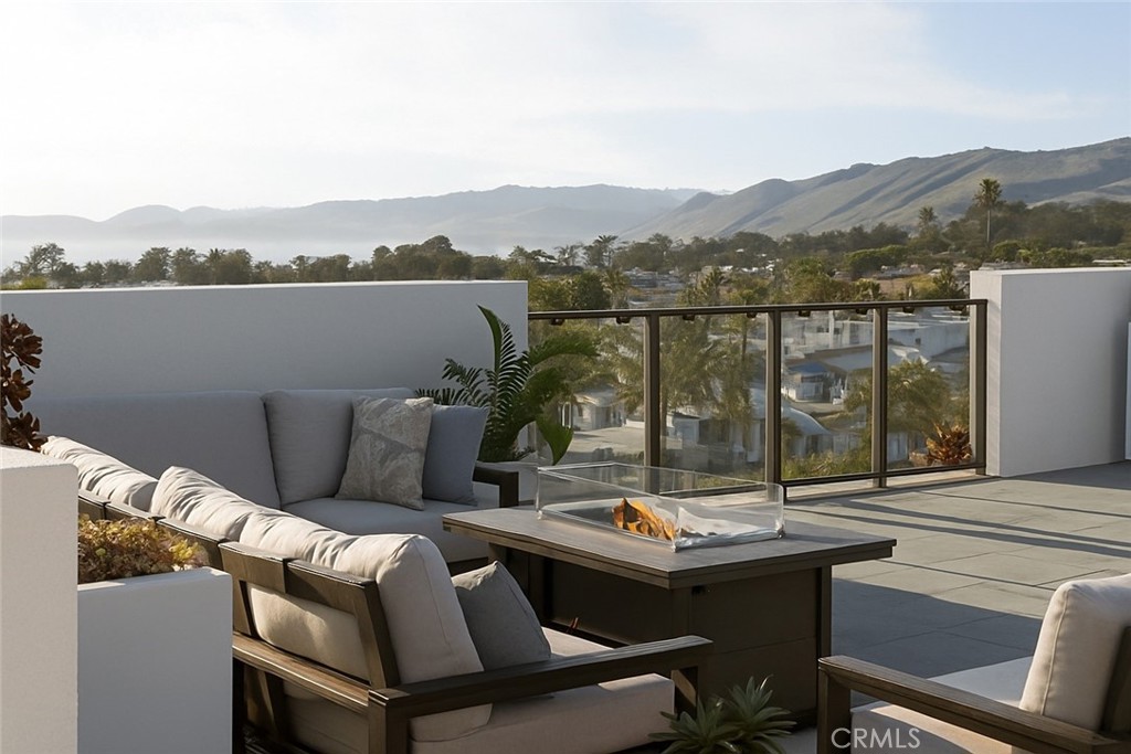 402 West Grand Avenue, Unit 302 Grover Beach, CA 93433 - Photo 10 of 10 a terrace of a house with outdoor seating