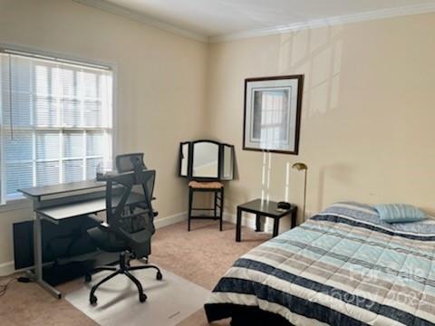 5931 Quail Hollow Road, Unit G Charlotte, NC 28210 - Photo 7 of 7 a bedroom with a bed a desk and chair