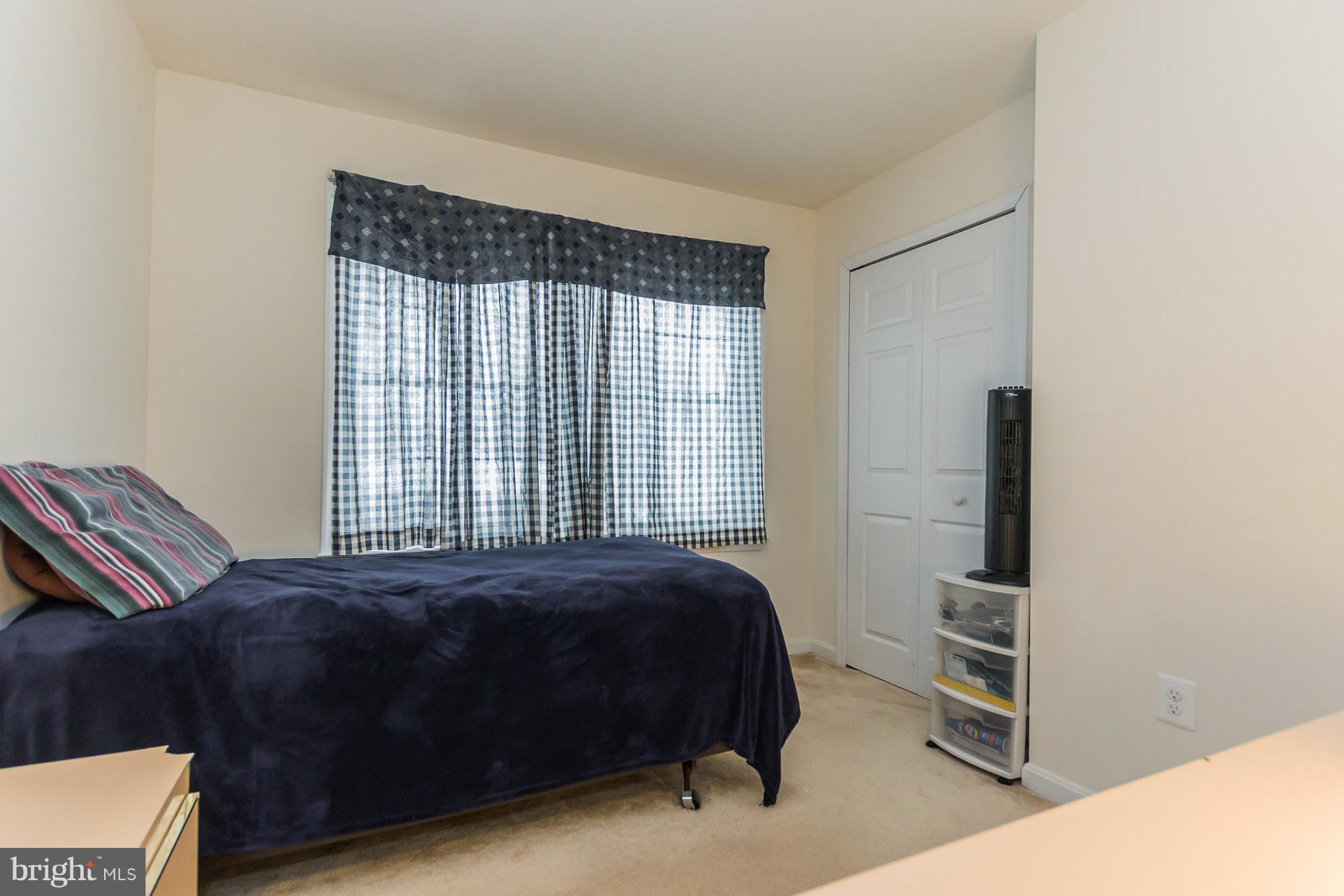 1336 Tenbrook Road Odenton, MD 21113 - Photo 22 of 30 a bedroom with a bed and a window