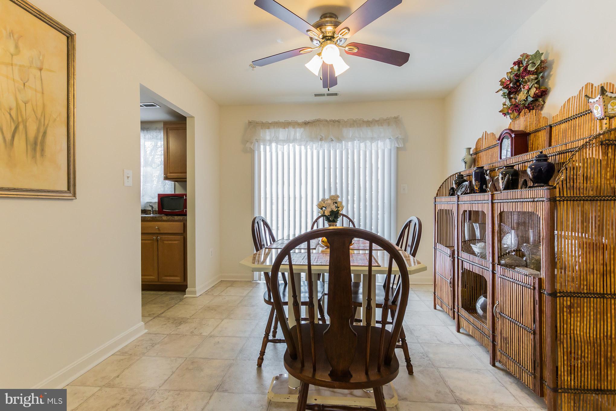 1336 Tenbrook Road Odenton, MD 21113 - Photo 8 of 30 a view of a dining room with furniture and chandelier