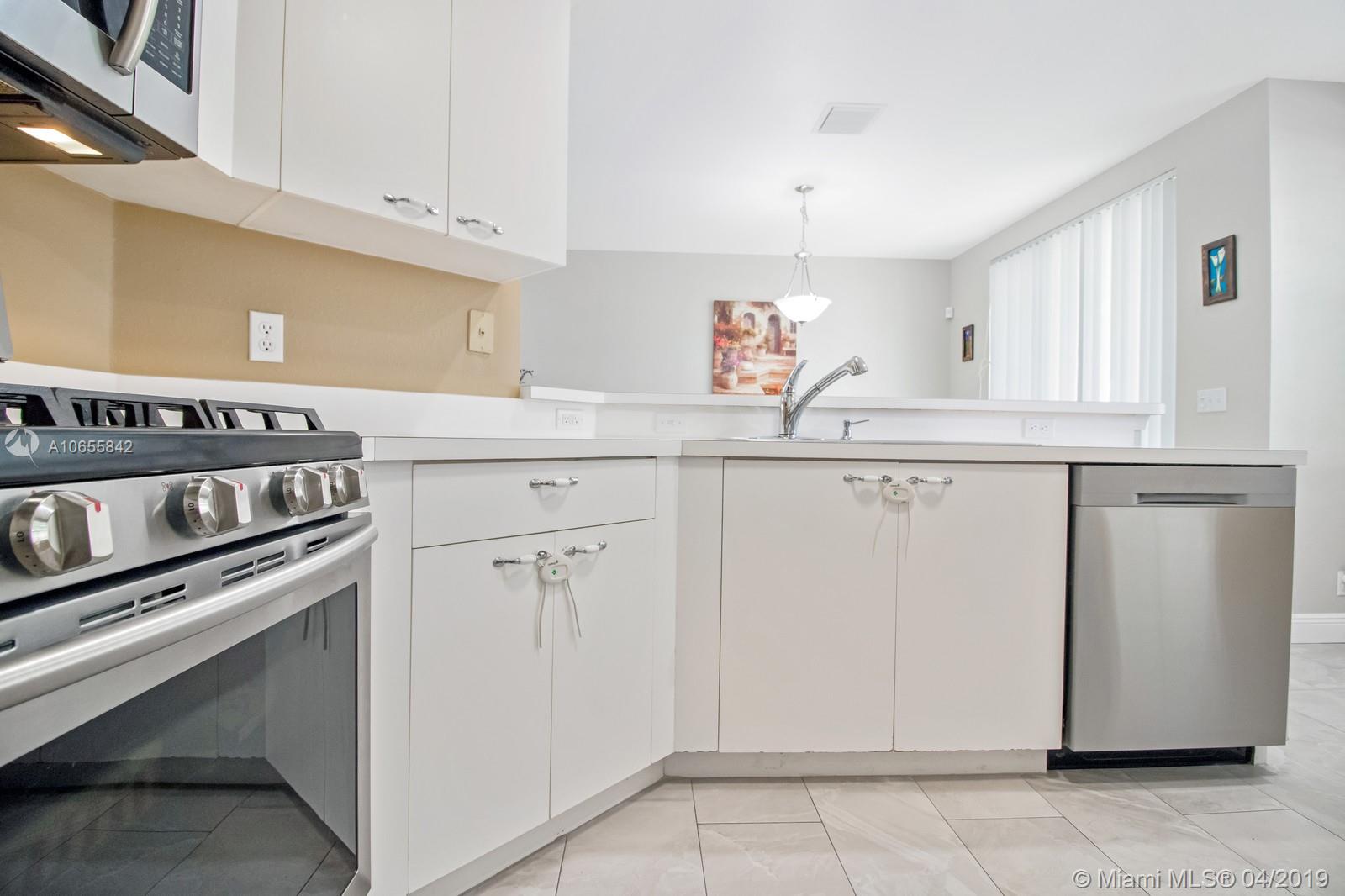 10871 Palm Ridge Lane Tamarac, FL 33321 - Photo 16 of 39 Gallery Image 16