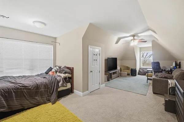 a bed room with a bed and furniture