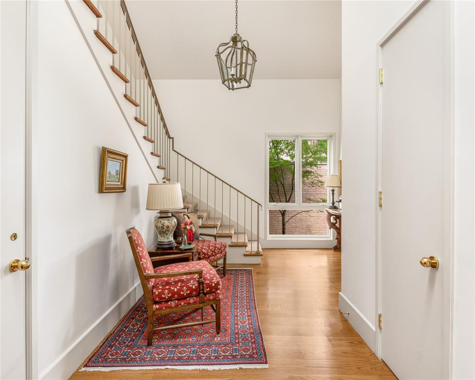 12102 Vendome Place Dallas, TX 75230 - Photo 4 of 24 a view of an entryway with wooden floor