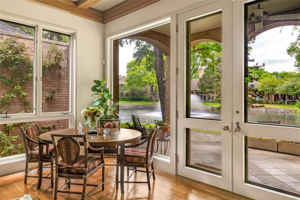 12102 Vendome Place Dallas, TX 75230 - Photo 8 of 24 a view of a dining room with furniture window and outside view