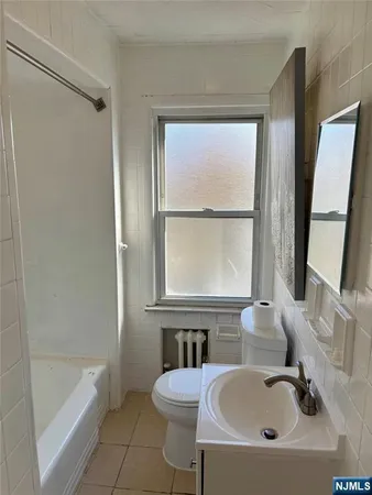 a bathroom with a sink and a bathtub