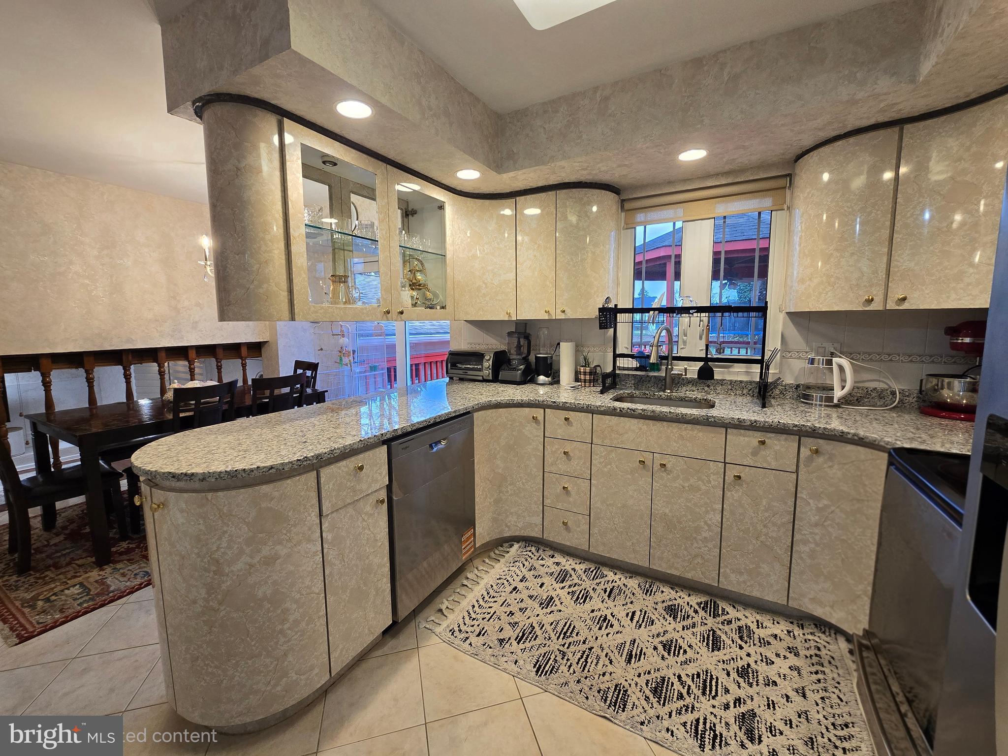 743 Bridgeview Road Feasterville-Trevose, PA 19053 - Photo 11 of 55 a kitchen with a sink appliances cabinets and furniture