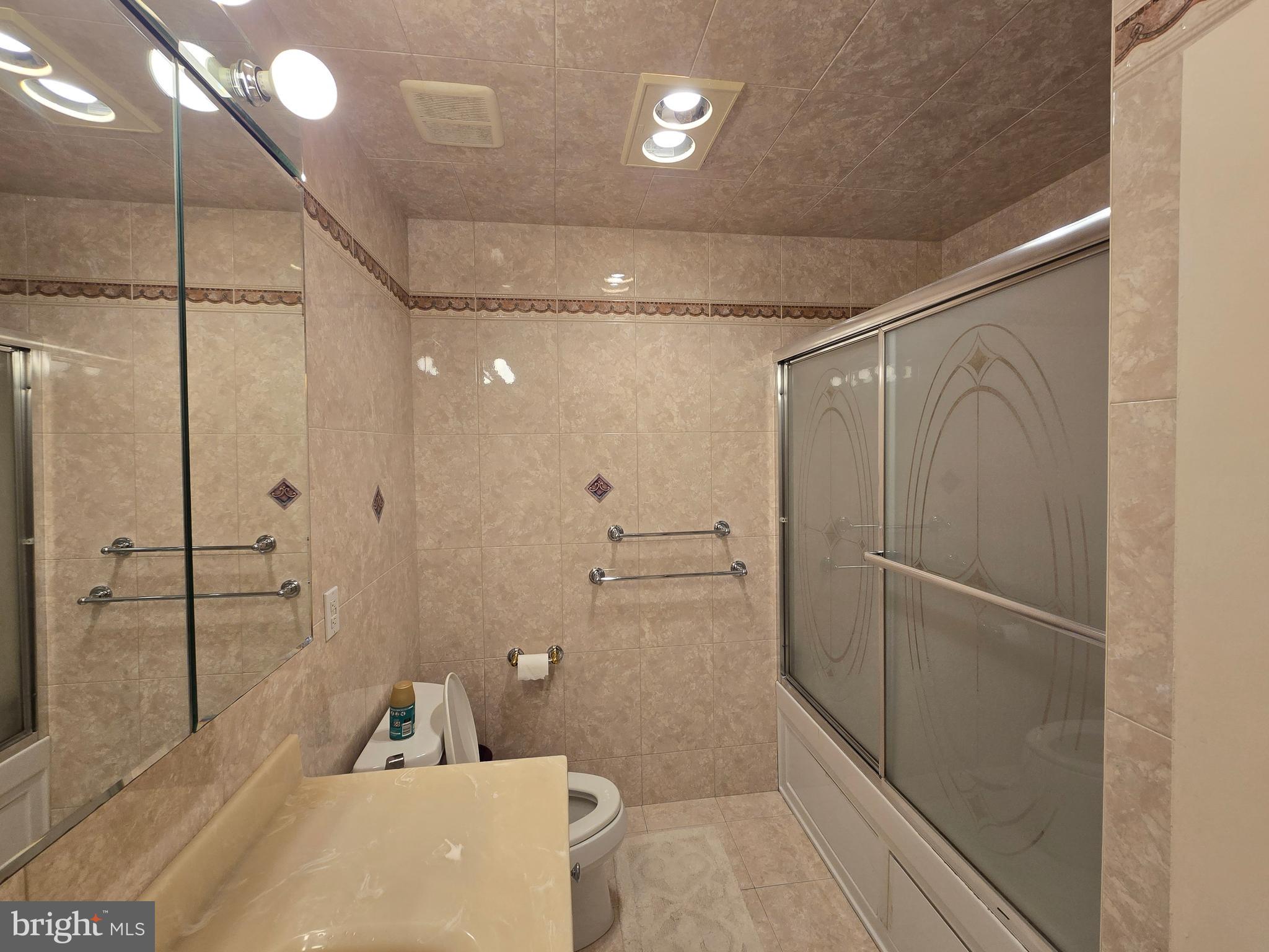 743 Bridgeview Road Feasterville-Trevose, PA 19053 - Photo 31 of 55 a bathroom with a tub and shower