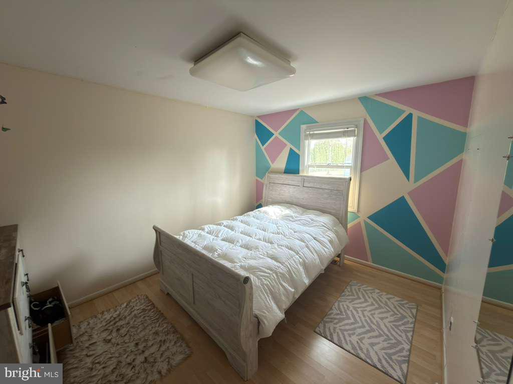 743 Bridgeview Road Feasterville-Trevose, PA 19053 - Photo 44 of 55 a bedroom with a bed and a dresser