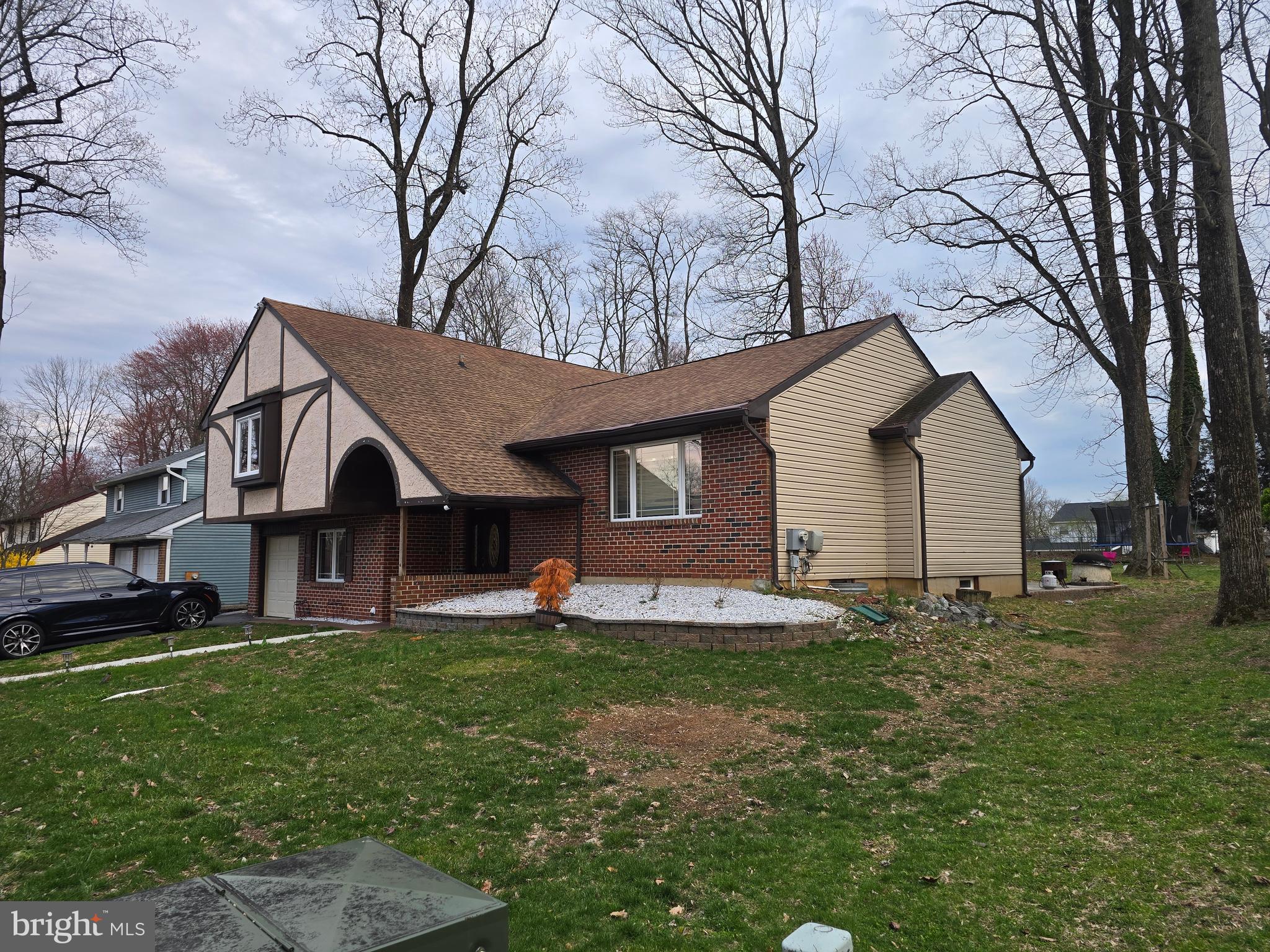 743 Bridgeview Road Feasterville-Trevose, PA 19053 - Photo 55 of 55 a front view of house with yard and green space