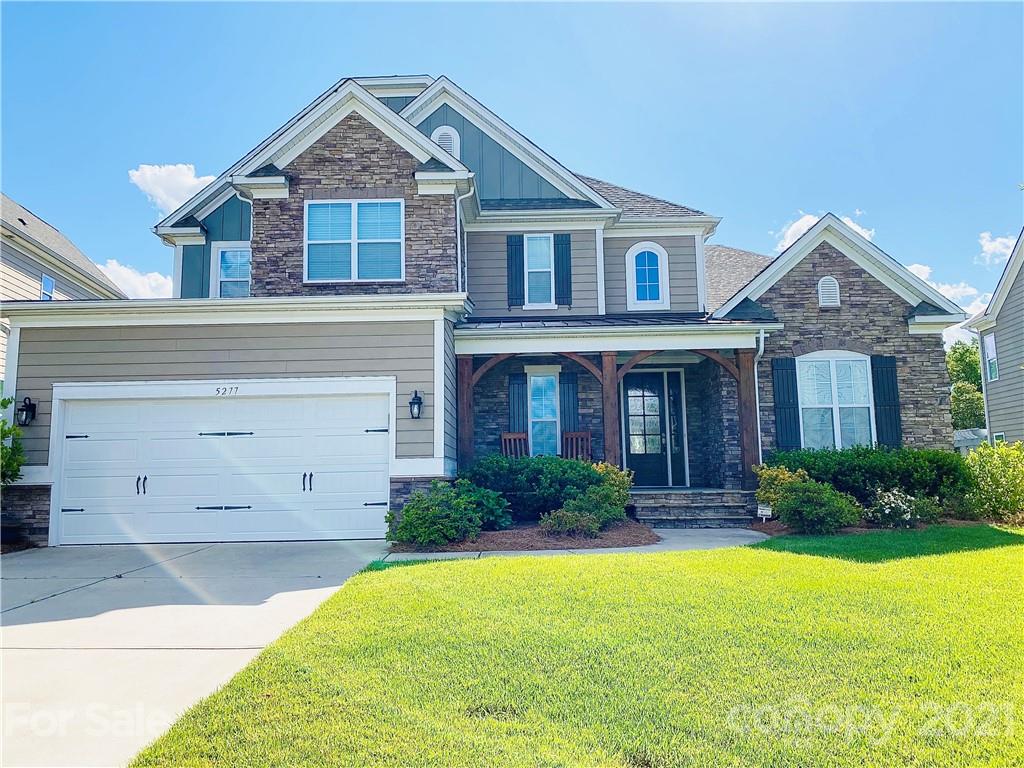 5277 Meadowcroft Way Fort Mill, SC 29708 - Photo 1 of 1 a front view of a house with garden