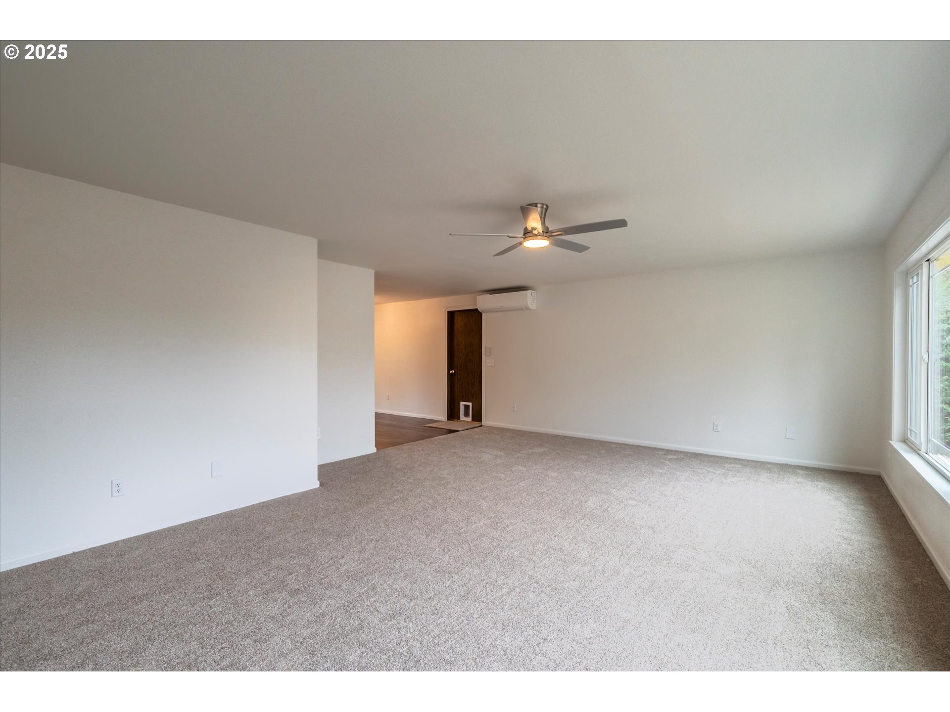 950 1st Street Northeast Bandon, OR 97411 - Photo 13 of 35 a view of a livingroom with an empty space