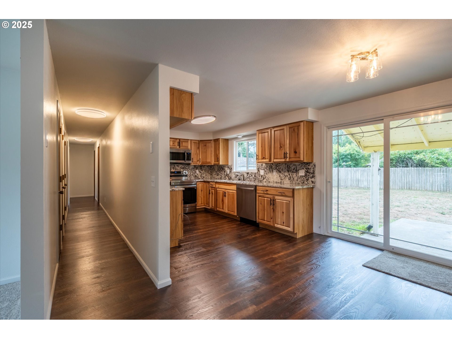 950 1st Street Northeast Bandon, OR 97411 - Photo 20 of 35 a view of kitchen with wooden floor
