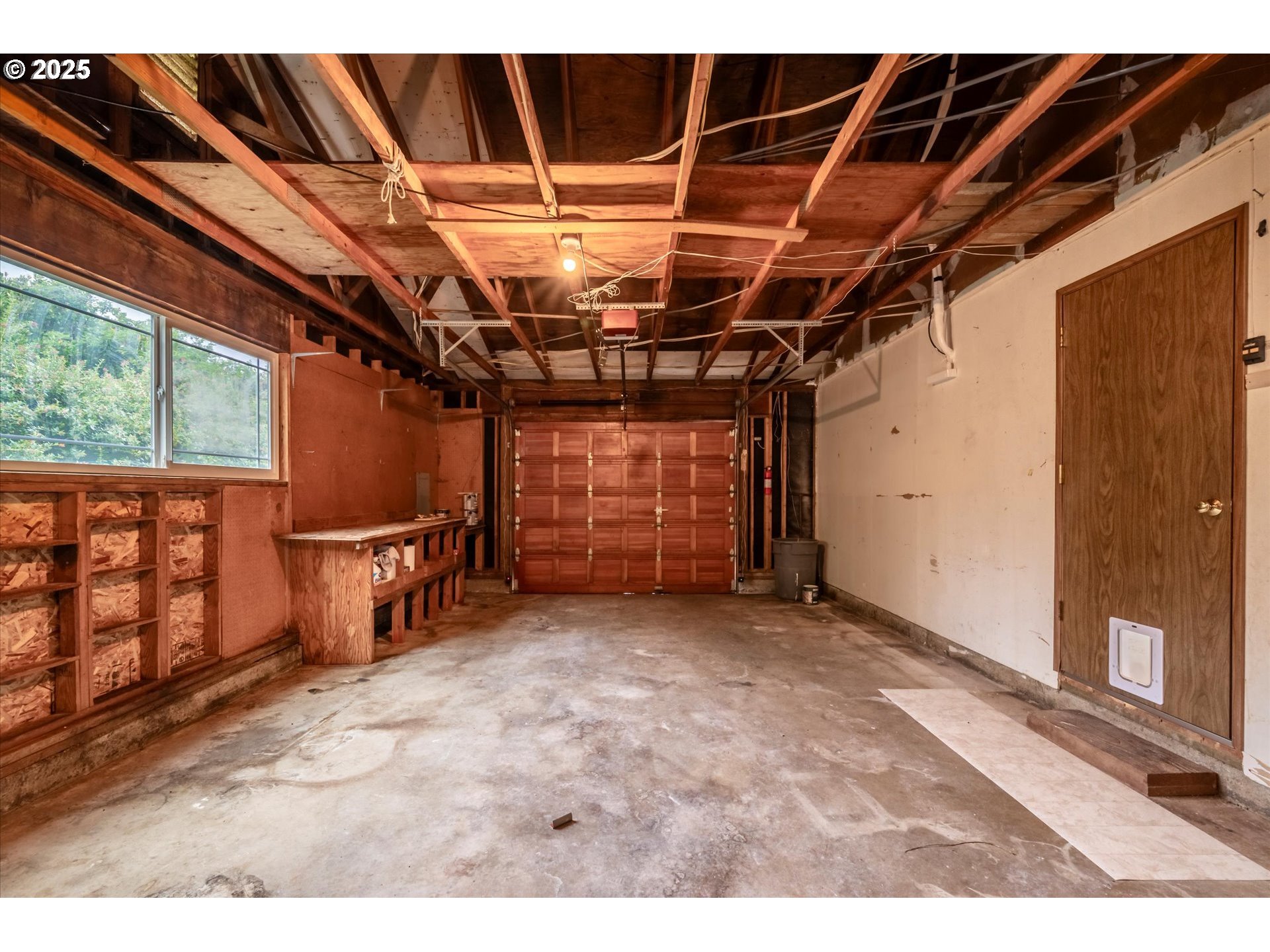 950 1st Street Northeast Bandon, OR 97411 - Photo 35 of 35 a view of a room with wooden walls