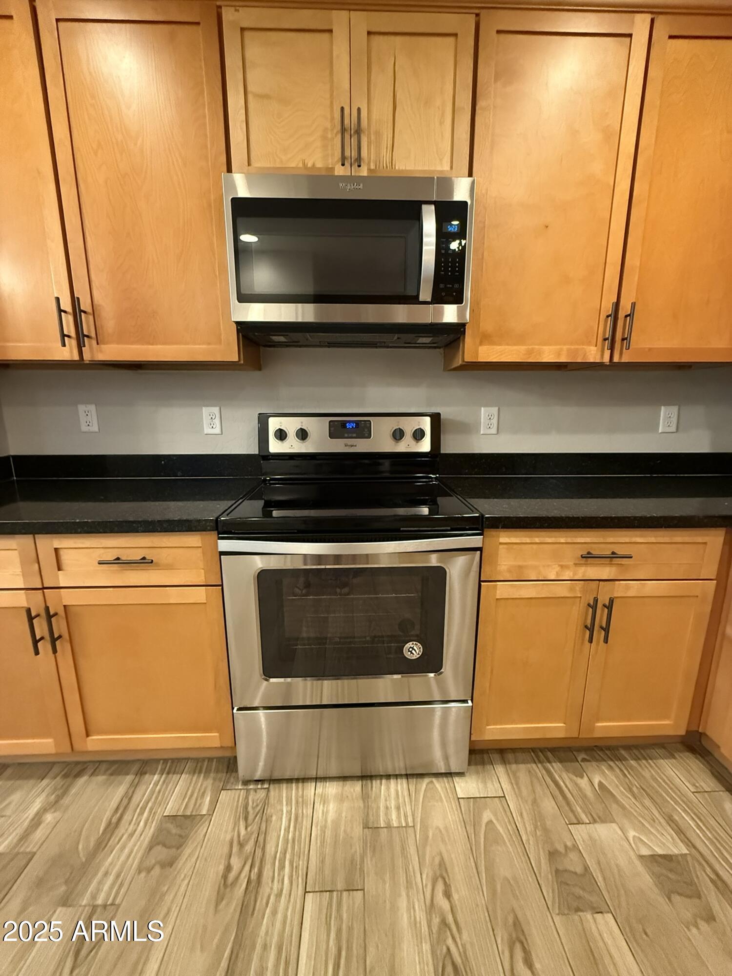 1736 West Pollack Street Phoenix, AZ 85041 - Photo 15 of 51 a view of kitchen with microwave and cabinets