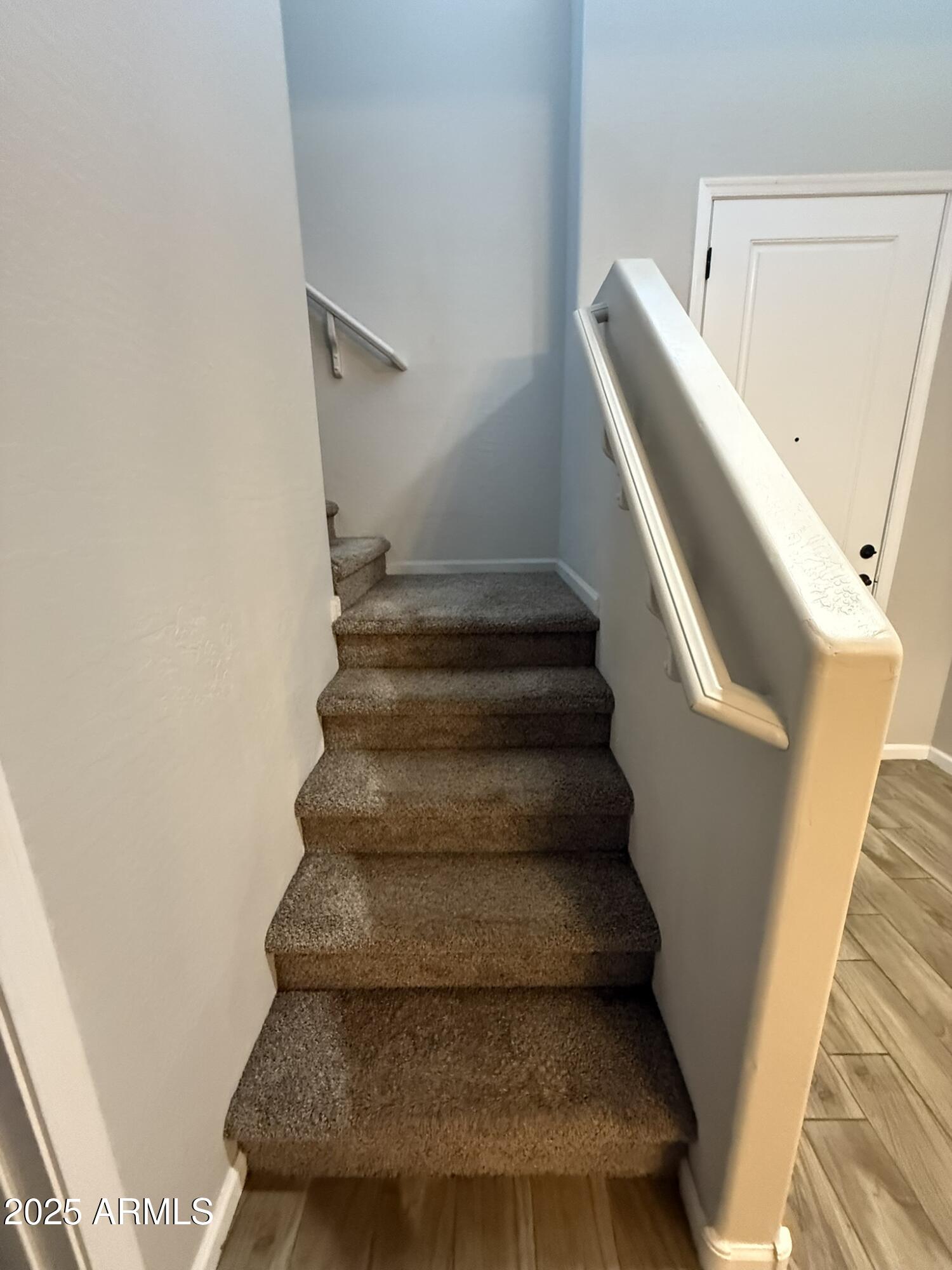 1736 West Pollack Street Phoenix, AZ 85041 - Photo 25 of 51 a view of staircase with white walls and windows