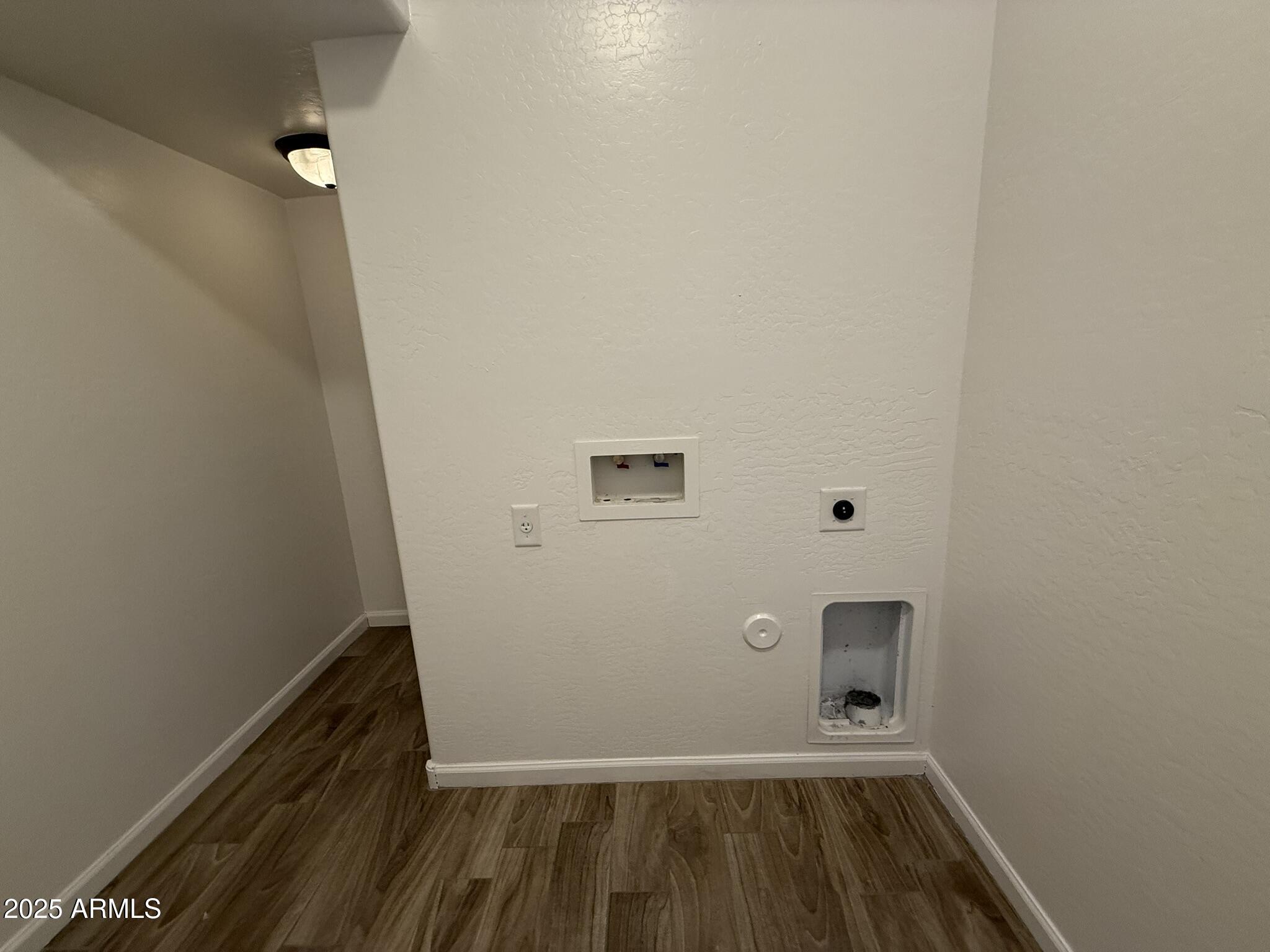 1736 West Pollack Street Phoenix, AZ 85041 - Photo 6 of 51 a view of a room with wooden floor