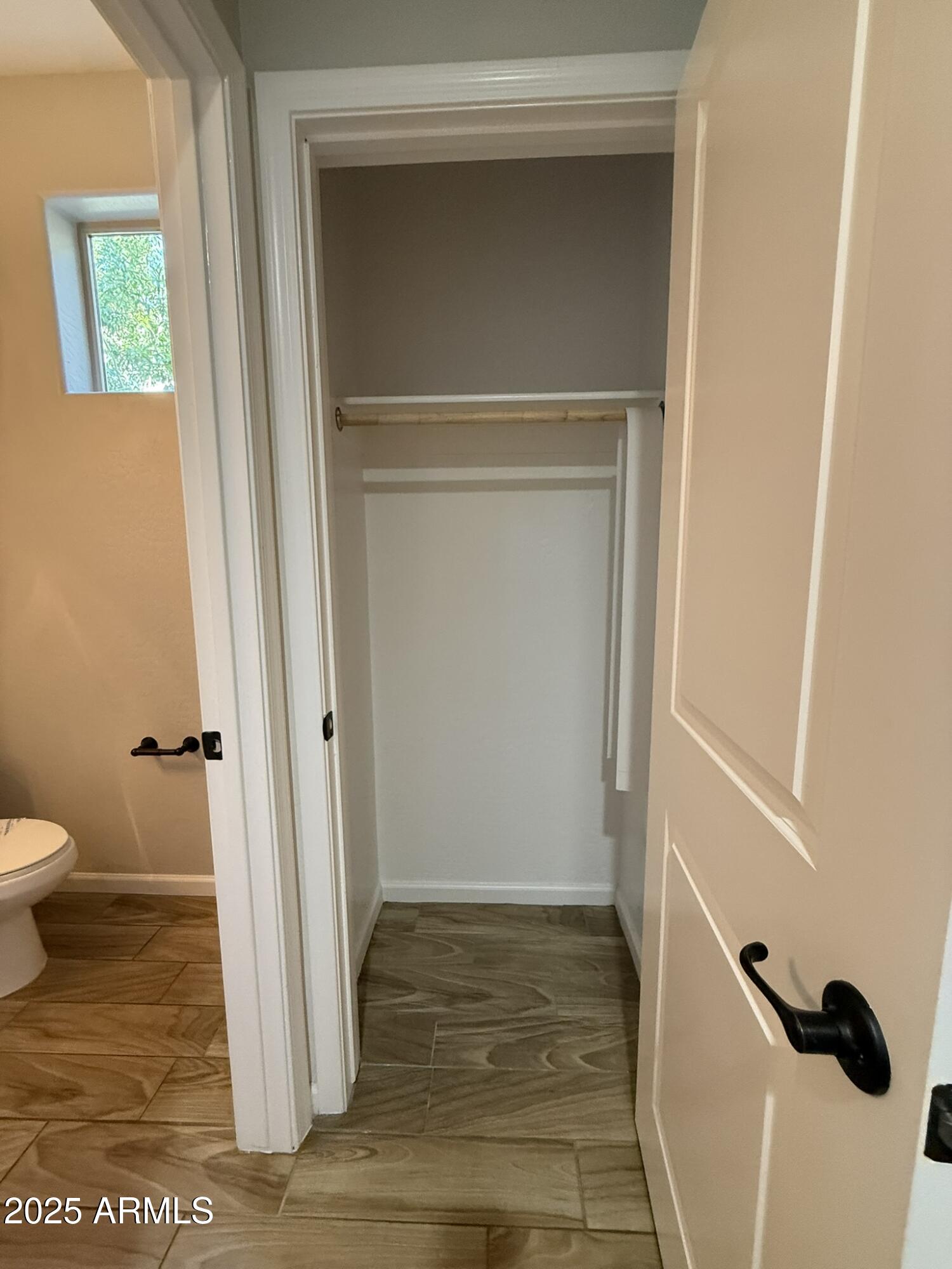 1736 West Pollack Street Phoenix, AZ 85041 - Photo 9 of 51 a bathroom with a sink and a toilet