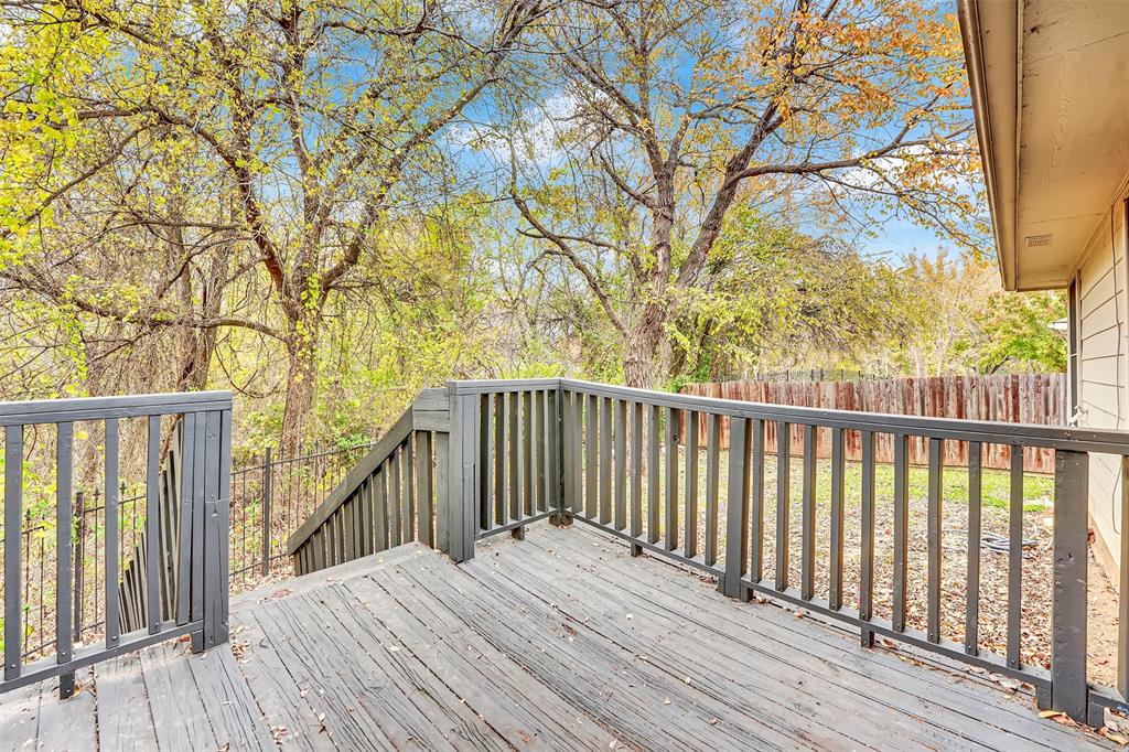 4507 Stones River Road Grand Prairie, TX 75052 - Photo 27 of 28 a view of balcony with wooden floor and fence