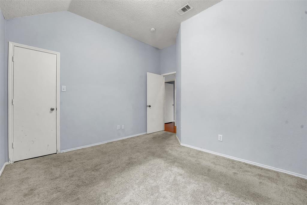 4507 Stones River Road Grand Prairie, TX 75052 - Photo 10 of 28 a view of an empty room
