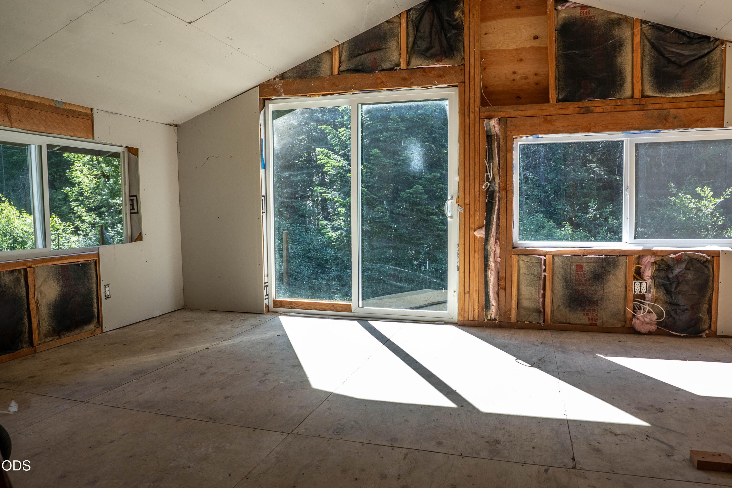8245 Jumpoff Joe Creek Road Grants Pass, OR 97526 - Photo 26 of 43 a view of a room with a large window