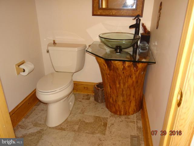 5538 Etzler Road Frederick, MD 21702 - Photo 14 of 30 Hallway powder room on main level