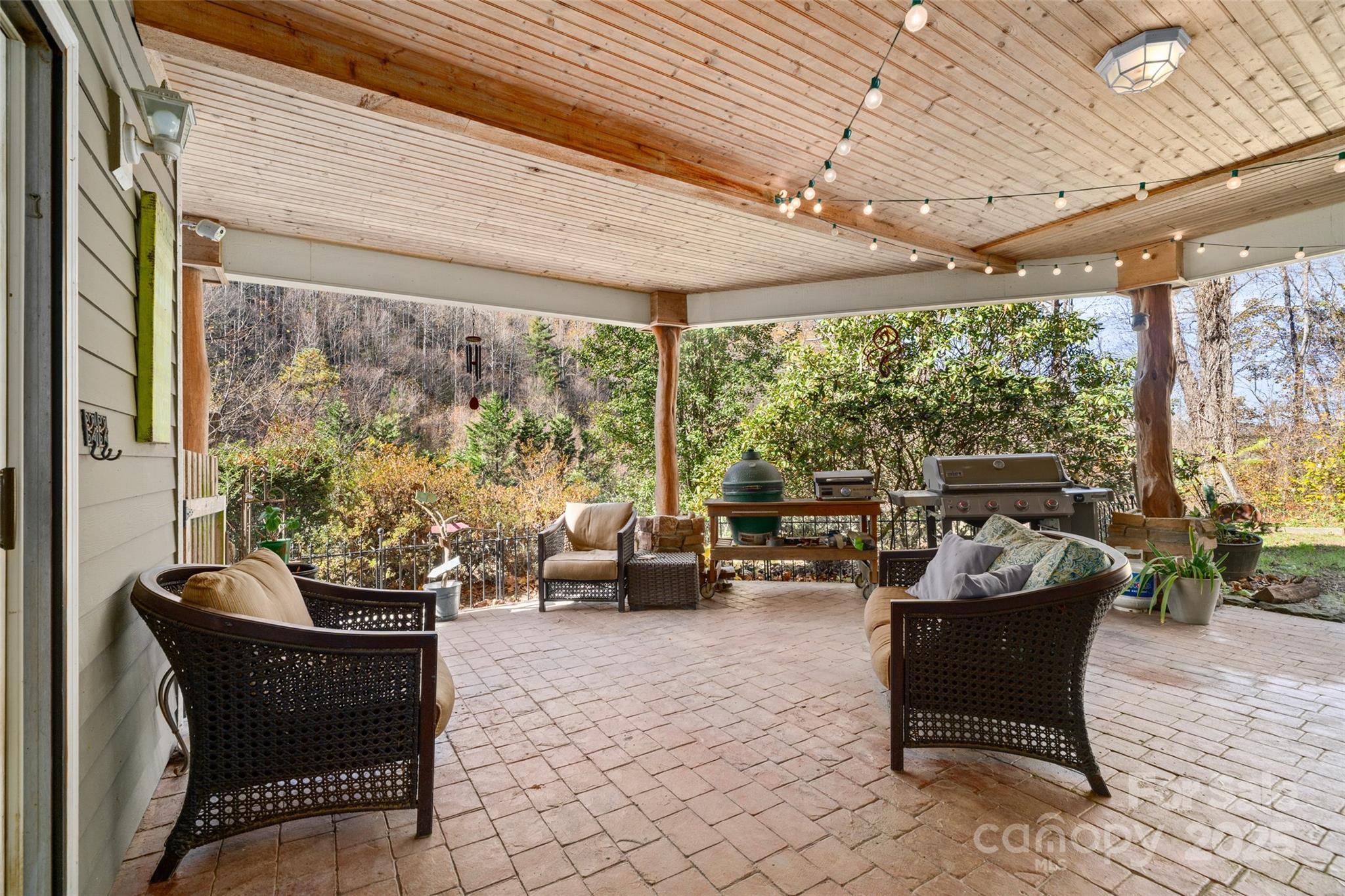 571 Terrys Gap Road Fletcher, NC 28732 - Photo 14 of 44 a building outdoor space with patio furniture