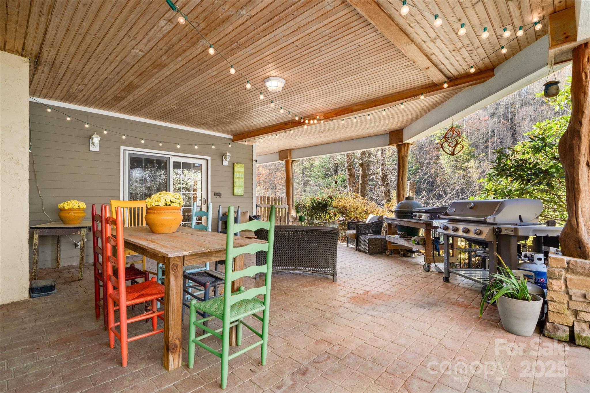 571 Terrys Gap Road Fletcher, NC 28732 - Photo 19 of 44 a view of a dining room with furniture window and outside view
