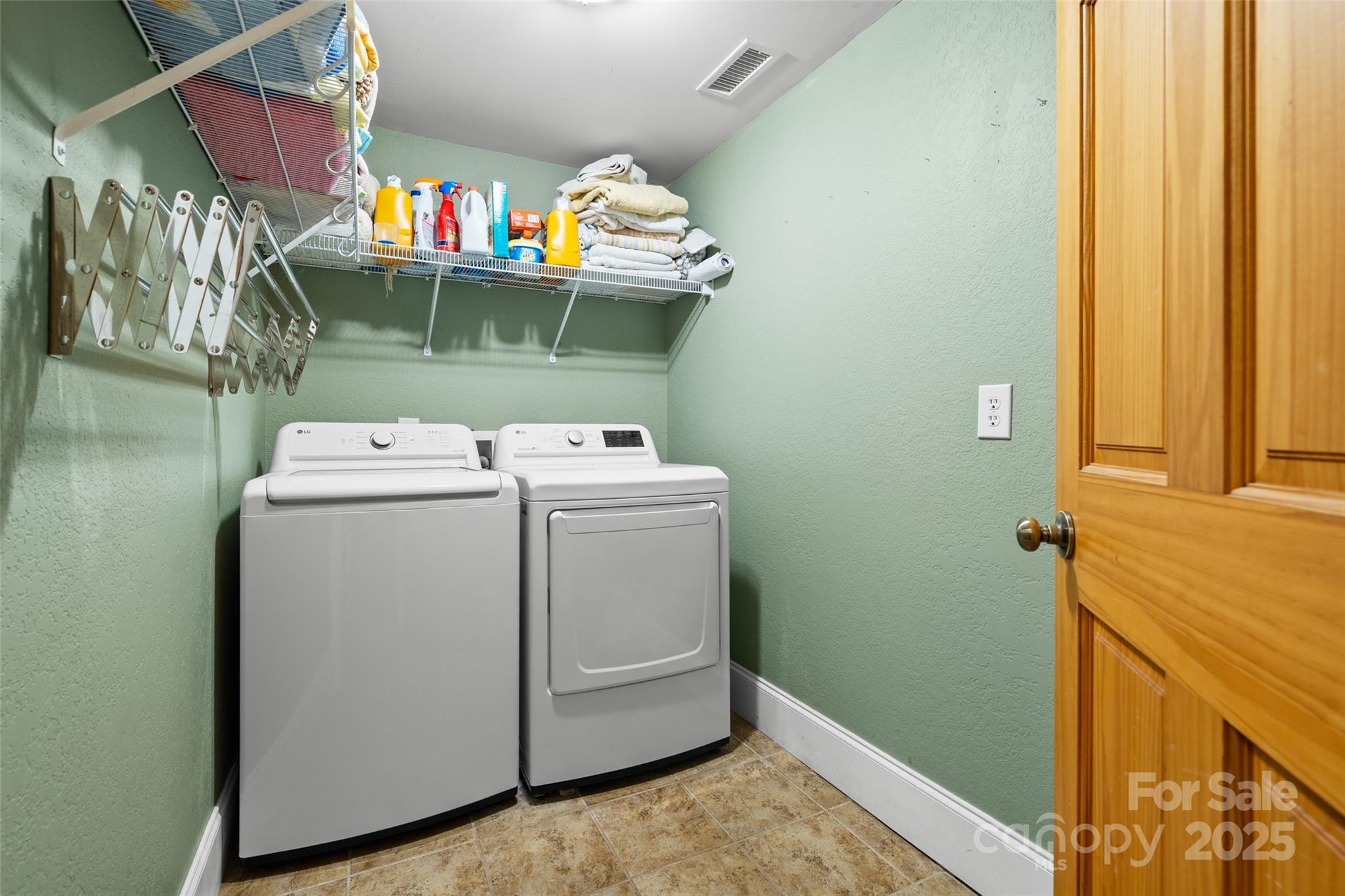 571 Terrys Gap Road Fletcher, NC 28732 - Photo 22 of 44 a utility room with dryer and washer
