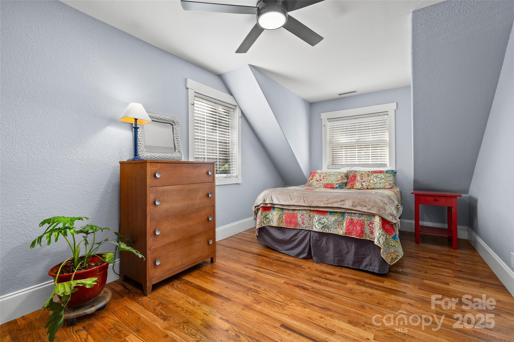 571 Terrys Gap Road Fletcher, NC 28732 - Photo 36 of 44 a bedroom with a bed and a window