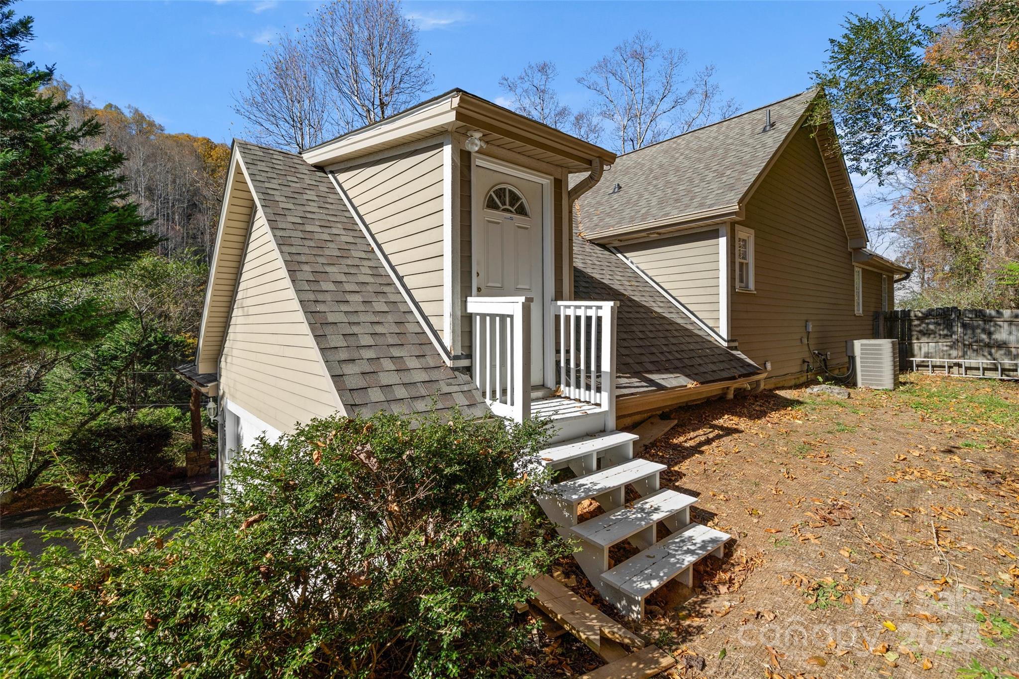 571 Terrys Gap Road Fletcher, NC 28732 - Photo 40 of 44 a view of a house with a yard