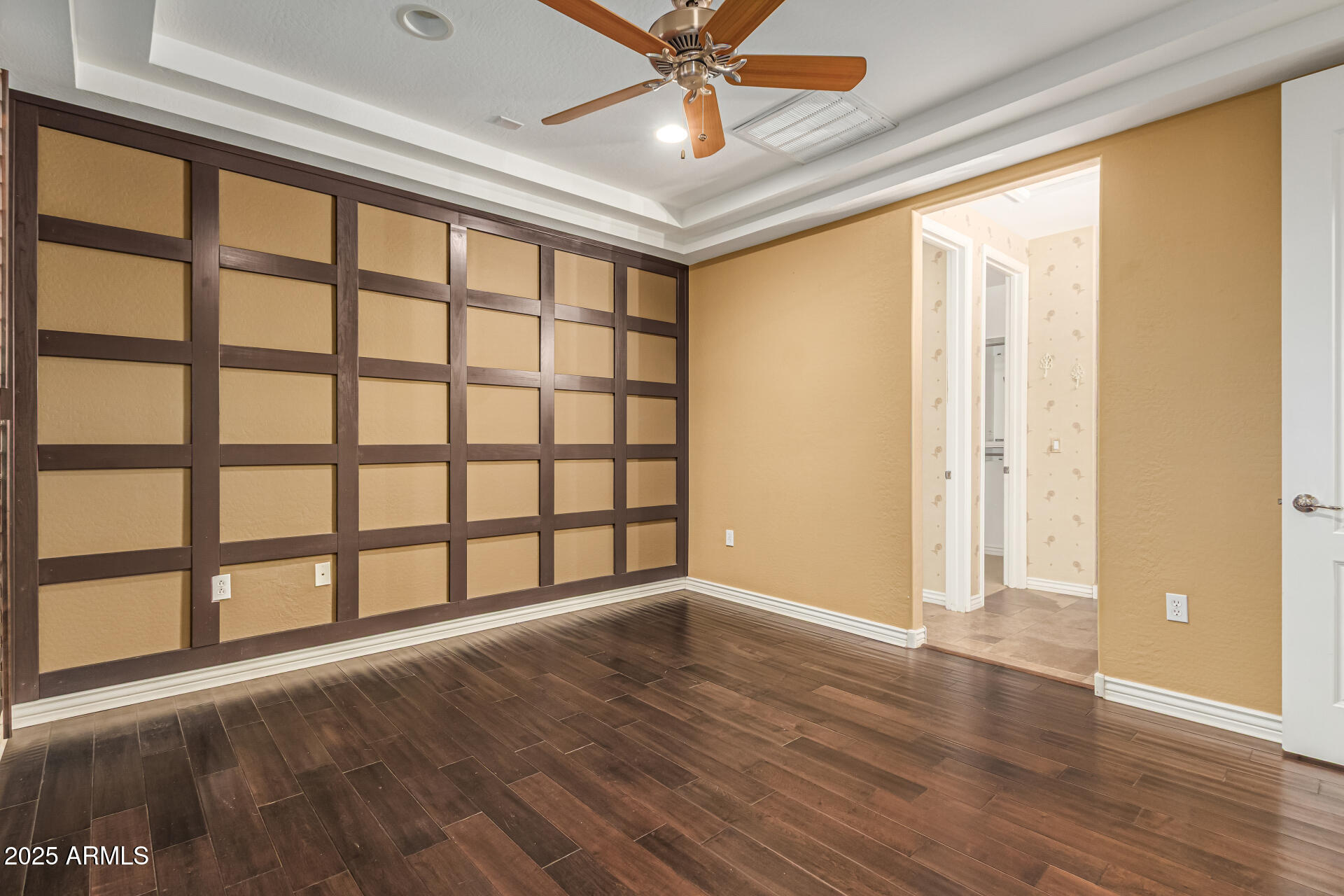 2482 East Roma Avenue Phoenix, AZ 85016 - Photo 20 of 39 a view of an empty room with window and wooden floor